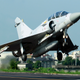 A Taiwan Air Force Mirage 2000 fighter jet land takes off from a closed section of highway.